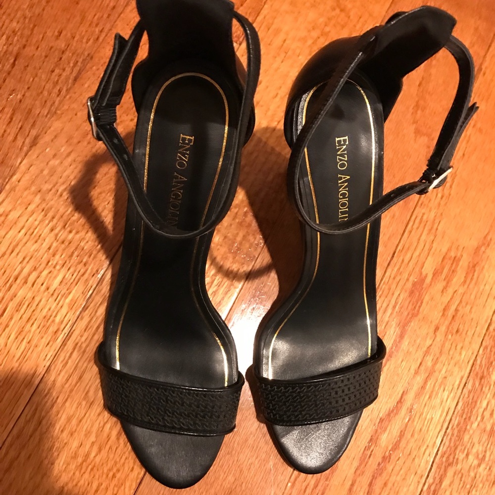 Enzo Angiolini black leather wedges.